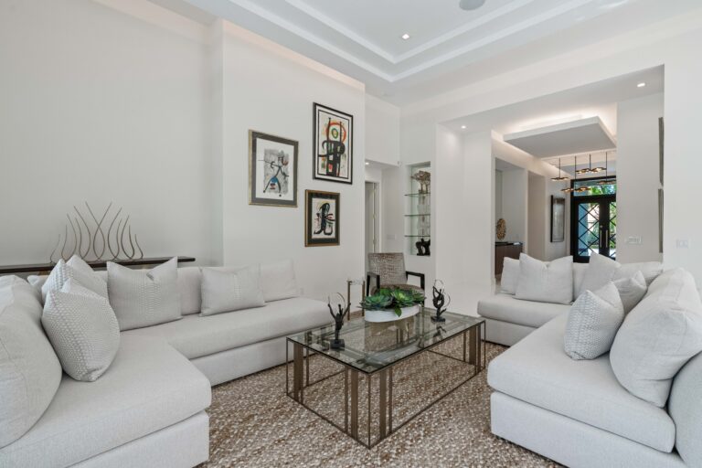 Delray Beach modern living room interior with neutral furniture, contemporary artwork, and open-concept luxury design.